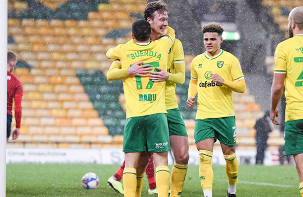 Norwich close in on promotion with 7-0 Huddersfield rout
