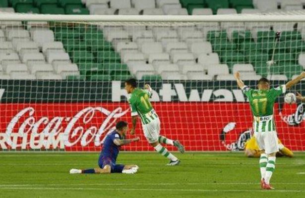 Atletico go top of La Liga with laboured draw against Betis