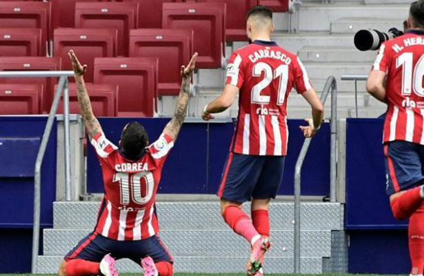 Atletico see off Huesca to stay in control of La Liga title race