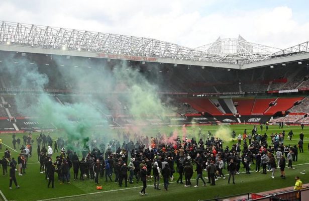 Manchester United fans mount protest against US owners as Premier League match against Liverpool postponed