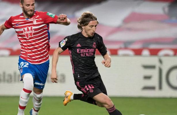 Modric signs new Real deal until end of next season